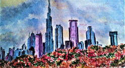 Burj Khalifa  skyline overlooking flame trees